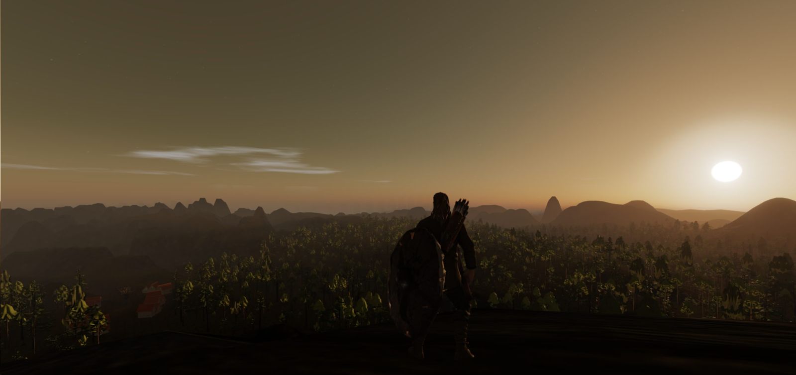 Fixenlow at dusk: a figure on a ridge above a forested valley